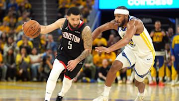 Apr 26, 2025; San Francisco, California, USA; Houston Rockets guard Fred VanVleet (5) dribbles against Golden State Warriors guard Moses Moody (right) during the fourth quarter of game three of first round for the 2024 NBA Playoffs at Chase Center. Mandatory Credit: Darren Yamashita-Imagn Images