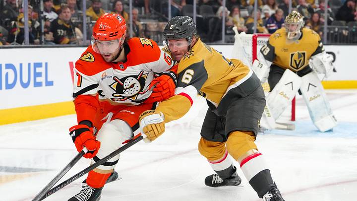 May 6, 2026; Las Vegas, Nevada, USA; Vegas Golden Knights defenseman Kaedan Korczak (6) attempts to tip the puck away from Anaheim Ducks left wing Cutter Gauthier (61) during the second period of game two of the second round of the 2026 Stanley Cup Playoffs at T-Mobile Arena. Mandatory Credit: Stephen R. Sylvanie-Imagn Images