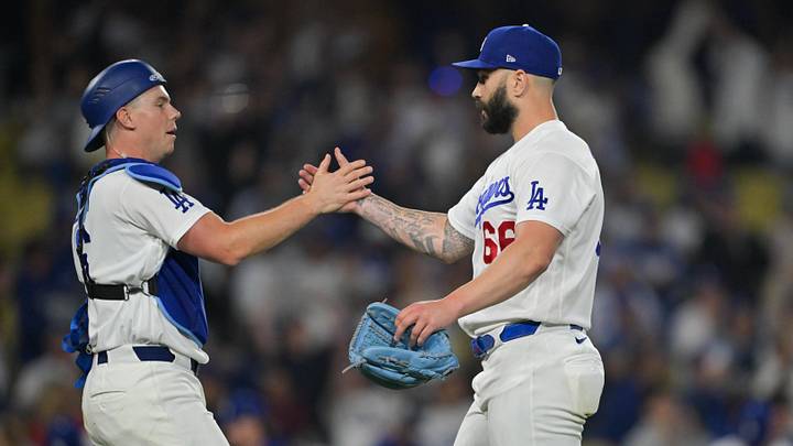 May 8, 2026; Los Angeles, California, USA;  Los Angeles Dodgers pitcher Tanner Scott (66) celebrates with Los Angeles Dodgers catcher Will Smith (16) after the game against the Atlanta Braves at Dodger Stadium. Mandatory Credit: Jayne Kamin-Oncea-Imagn Images