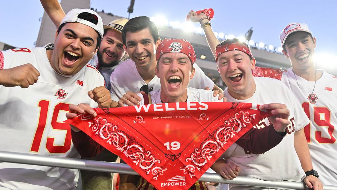 Sep 11, 2026; Chestnut Hill, Massachusetts, USA; Boston College Eagles fans hold up a red bandana for Welles Crowther and cheer before the start of a game against the Rutgers Scarlet Knights at Alumni Stadium. Mandatory Credit: Eric Canha-Imagn Images Sep 11, 2026; Chestnut Hill, Massachusetts, USA; Boston College Eagles fans hold up a red bandana for Welles Crowther and cheer before the start of a game against the Rutgers Scarlet Knights at Alumni Stadium. Mandatory Credit: Eric Canha-Imagn Images