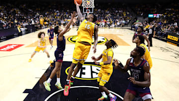Missouri Tigers center Shawn Phillips Jr. (15) drives into the paint, in a game against the South Carolina State Bulldogs this season.