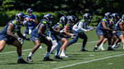 Jun 11, 2025; Renton, WA, USA; Seattle Seahawks offensive line units take part in drills during mini-camp at Virginia Mason Athletic Center. Mandatory Credit: Stephen Brashear-Imagn Images