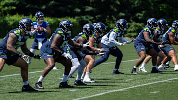 Jun 11, 2025; Renton, WA, USA; Seattle Seahawks offensive line units take part in drills during mini-camp at Virginia Mason Athletic Center. Mandatory Credit: Stephen Brashear-Imagn Images