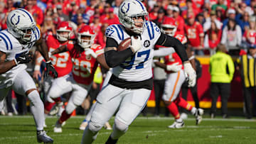 Nov 23, 2025; Kansas City, Missouri, USA;  Indianapolis Colts defensive end Laiatu Latu (97) runs after an interception against the Kansas City Chiefs in the first quarter at GEHA Field at Arrowhead Stadium. Mandatory Credit: Denny Medley-Imagn Images