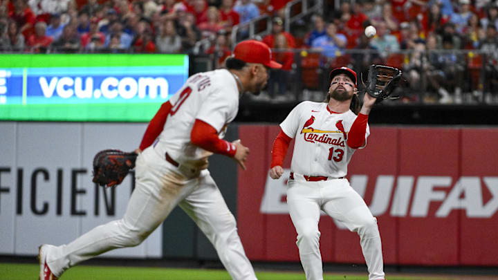 Jun 5, 2025; St. Louis, Missouri, USA; St. Louis Cardinals right fielder Ryan Vilade (13) catches a fly ball in foul territory against the Kansas City Royals during the sixth inning at Busch Stadium. Mandatory Credit: Jeff Curry-Imagn Images Jun 5, 2025; St. Louis, Missouri, USA; St. Louis Cardinals right fielder Ryan Vilade (13) catches a fly ball in foul territory against the Kansas City Royals during the sixth inning at Busch Stadium. Mandatory Credit: Jeff Curry-Imagn Images