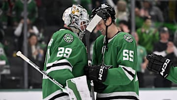 Dec 8, 2024; Dallas, Texas, USA; Dallas Stars goaltender Jake Oettinger (29) and defenseman Thomas Harley (55) celebrate the Stars victory over the Calgary Flames at the American Airlines Center. Mandatory Credit: Jerome Miron-Imagn Images