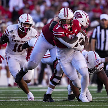 Sep 7, 2024; Madison, Wisconsin, USA;  Wisconsin Badgers running back Dilin Jones (7) during the game against the South Dakota Coyotes at Camp Randall Stadium. Mandatory Credit: Jeff Hanisch-Imagn Images
