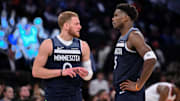 Oct 9, 2025; New York, New York, USA; Minnesota Timberwolves guard Donte Divincenzo and guard Anthony Edwards (5) talk during the second half against the New York Knicks at Madison Square Garden.