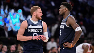 Oct 9, 2025; New York, New York, USA; Minnesota Timberwolves guard Donte Divincenzo and guard Anthony Edwards (5) talk during the second half against the New York Knicks at Madison Square Garden.