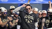 Nov 1, 2024; Los Angeles, CA, USA;  Los Angeles Dodgers first base Freddie Freeman (5) speaks to fans during the World Series Championship Celebration at Dodger Stadium. 