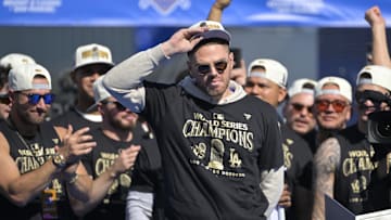 Nov 1, 2024; Los Angeles, CA, USA;  Los Angeles Dodgers first base Freddie Freeman (5) speaks to fans during the World Series Championship Celebration at Dodger Stadium. 