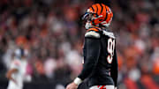 Cincinnati Bengals defensive end Trey Hendrickson (91) smiles after forcing the Broncos to punt during overtime of the NFL Week 17 game between the Cincinnati Bengals and the Denver Broncos at Paycor Stadium in downtown Cincinnati on Saturday, Dec. 28, 2024. The Bengals took a 30-24 win in overtime to remain in the post season chase.