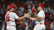 Jul 24, 2025; St. Louis, Missouri, USA;  St. Louis Cardinals relief pitcher Ryan Helsley (56) celebrates with catcher Pedro Pages (43) after the Cardinals defeated the San Diego Padres at Busch Stadium. Mandatory Credit: Jeff Curry-Imagn Images