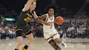 Jan 30, 2025; Austin, Texas, USA; Texas Longhorns guard Rori Harmon (3) drives to the basket against the Missouri Tigers guard Averi Kroenke (21) during the first half at Moody Center. Mandatory Credit: Scott Wachter-Imagn Images