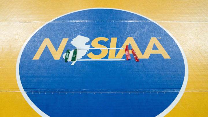Ankle bracelets sit in the middle of the NJSIAA wrestling mat finals of the NJSIAA individual wrestling state championships at Boardwalk Hall in Atlantic City on Friday, March 8, 2025. Ankle bracelets sit in the middle of the NJSIAA wrestling mat finals of the NJSIAA individual wrestling state championships at Boardwalk Hall in Atlantic City on Friday, March 8, 2025.