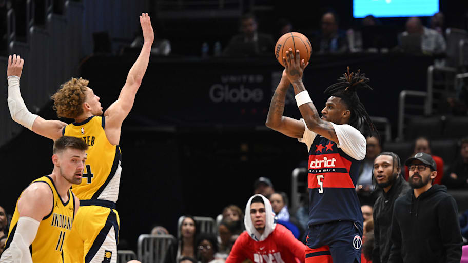 Washington Wizards guard Jamir Watkins shoots against Indiana Pacers guard Taelon Peter.