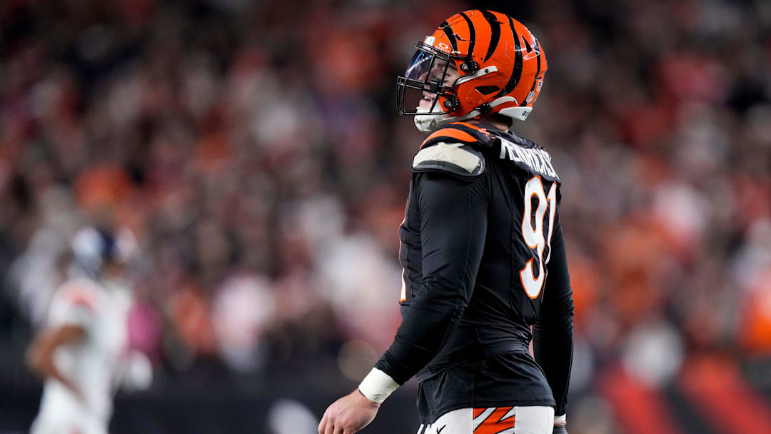 Cincinnati Bengals defensive end Trey Hendrickson (91) smiles after forcing the Broncos to punt during overtime of the NFL Week 17 game between the Cincinnati Bengals and the Denver Broncos at Paycor Stadium in downtown Cincinnati on Saturday, Dec. 28, 2024. The Bengals took a 30-24 win in overtime to remain in the post season chase.