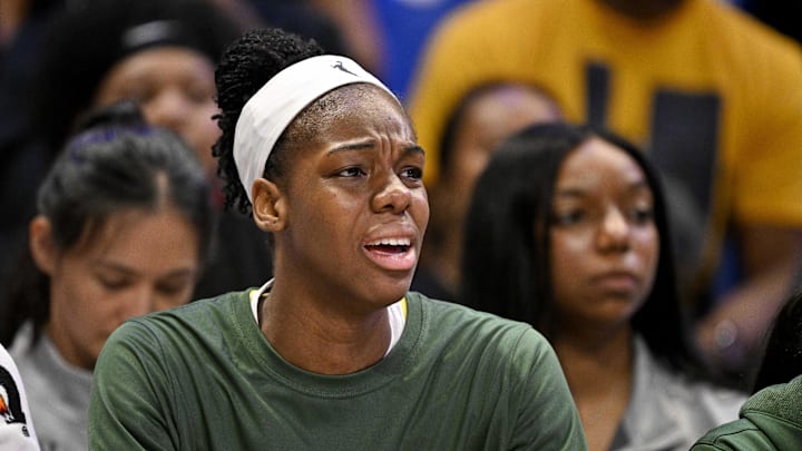 May 19, 2025; Arlington, Texas, USA;  Seattle Storm center Dominique Malonga (14) looks on from the team bench during the second half against the Dallas Wings at College Park Center. Mandatory Credit: Jerome Miron-Imagn Images