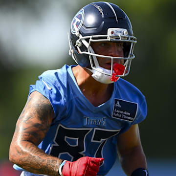 Jul 23, 2025; Nashville, TN, USA;  Tennessee Titans wide receiver Xavier Restrepo (87) goes through drills during training camp at Ascension Saint Thomas Sports Park. Mandatory Credit: Steve Roberts-Imagn Images