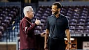 Mississippi State Director of Athletics Zac Selmon talks with Mississippi State Head Coach Brian O’Connor during his first day Dudy Noble Field at Polk-Dement Stadium in Starkville, MS. 