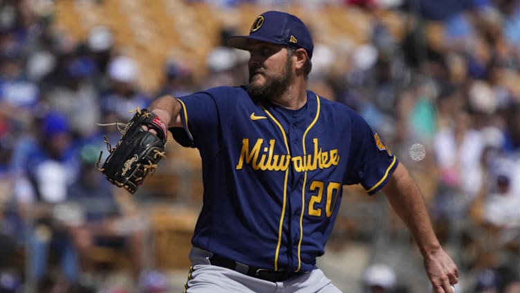 Mar 24, 2023; Phoenix, Arizona, USA; Milwaukee Brewers starting pitcher Wade Miley (20) throws