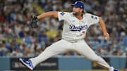 Oct 8, 2025; Los Angeles, California, USA; Los Angeles Dodgers pitcher Clayton Kershaw (22) pitches during the eighth inning against the Philadelphia Phillies during game three of the NLDS round for the 2025 MLB playoffs at Dodger Stadium. Mandatory Credit: Jayne Kamin-Oncea-Imagn Images