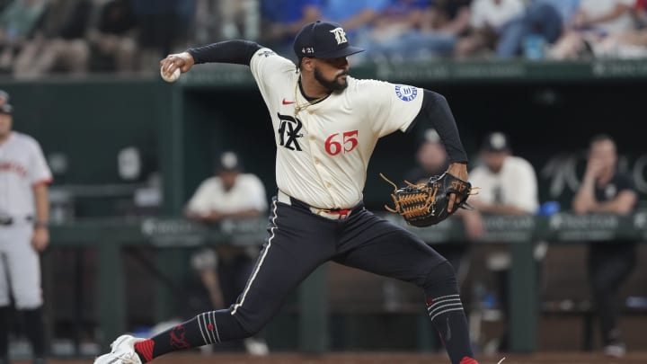 Jun 7, 2024; Arlington, Texas, USA; Texas Rangers relief pitcher Grant Anderson (65) delivers a pitch to the San Francisco Giants during the seventh inning at Globe Life Field. Mandatory Credit: Jim Cowsert-USA TODAY Sports