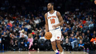 Feb 14, 2024; Orlando, Florida, USA; New York Knicks guard Alec Burks (18) dribbles the ball against