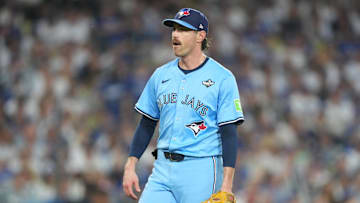 Oct 28, 2025; Los Angeles, California, USA; Toronto Blue Jays pitcher Shane Bieber (57) reacts in the third inning against the Los Angeles Dodgers during game four of the 2025 MLB World Series at Dodger Stadium. Mandatory Credit: Kirby Lee-Imagn Images