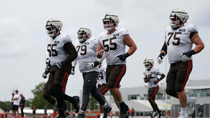 Aug 4, 2024; Cleveland Browns guard Germain Ifedi (65) and offensive tackle Dawand Jones (79) and center Ethan Pocic (55) and guard Joel Bitonio (75) during practice at the Browns training facility in Berea, Ohio. Mandatory Credit: Bob Donnan-Imagn Images