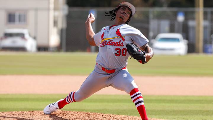 Feb 14, 2026; Jupiter, FL, USA; St. Louis Cardinals pitcher Tink Hence (30) delivers a pitch during a spring training workout at Roger Dean Chevrolet Stadium. Mandatory Credit: Sam Navarro-Imagn Images