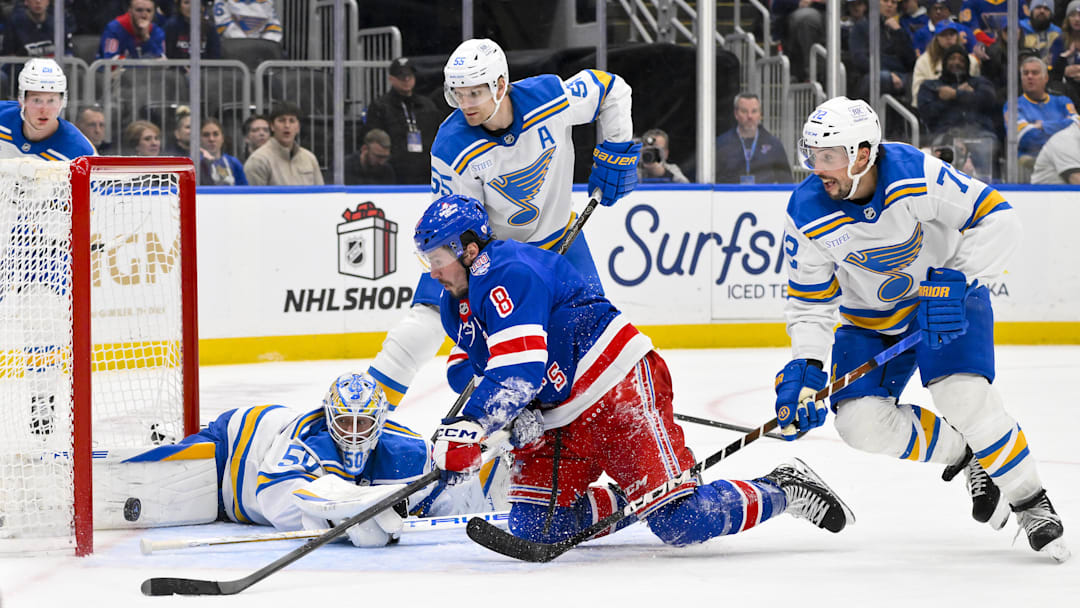 Dec 18, 2025; St. Louis, Missouri, USA; St. Louis Blues goaltender Jordan Binnington (50) defenseman Colton Parayko (55) and defenseman Justin Faulk (72) defends the net against New York Rangers left wing J.T. Miller (8) during the third period at Enterprise Center. Mandatory Credit: Jeff Curry-Imagn Images Dec 18, 2025; St. Louis, Missouri, USA; St. Louis Blues goaltender Jordan Binnington (50) defenseman Colton Parayko (55) and defenseman Justin Faulk (72) defends the net against New York Rangers left wing J.T. Miller (8) during the third period at Enterprise Center. Mandatory Credit: Jeff Curry-Imagn Images