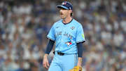 Oct 28, 2025; Los Angeles, California, USA; Toronto Blue Jays pitcher Shane Bieber (57) reacts in the third inning against the Los Angeles Dodgers during game four of the 2025 MLB World Series at Dodger Stadium. Mandatory Credit: Kirby Lee-Imagn Images