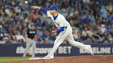 Sep 27, 2024; Toronto, Ontario, CAN; Toronto Blue Jays relief pitcher Brett de Geus (31) throws a pitch against the Miami Marlins during the seventh inning at Rogers Centre. Mandatory Credit: Nick Turchiaro-Imagn Images