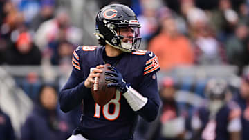 Dec 22, 2024; Chicago, Illinois, USA; Chicago Bears quarterback Caleb Williams (18) looks to pass against the Detroit Lions during the second quarter at Soldier Field. Mandatory Credit: Daniel Bartel-Imagn Images