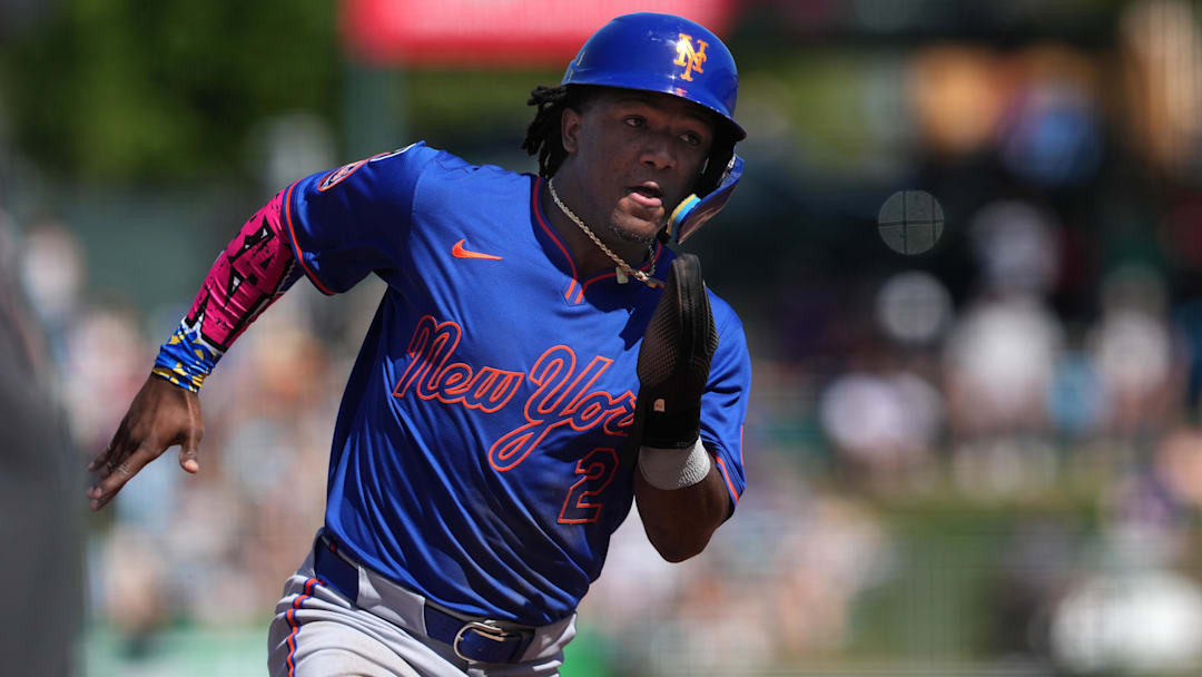 Apr 13, 2025; West Sacramento, California, USA; New York Mets second baseman Luisangel Acuna (2) runs to second base against the Athletics during the seventh inning at Sutter Health Park. Mandatory Credit: Darren Yamashita-Imagn Images
