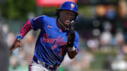 Apr 13, 2025; West Sacramento, California, USA; New York Mets second baseman Luisangel Acuna (2) runs to second base against the Athletics during the seventh inning at Sutter Health Park. Mandatory Credit: Darren Yamashita-Imagn Images
