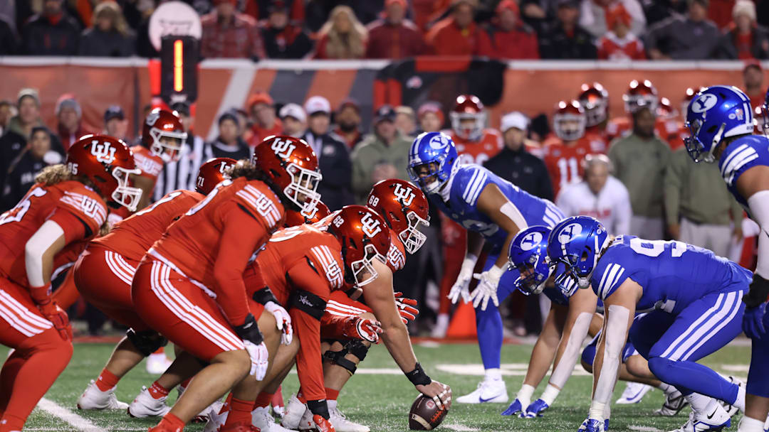 The Utah Utes offense lines up against the Brigham Young Cougars defense during the first quarter at Rice-Eccles Stadium.