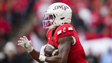 Oct 25, 2025; Cincinnati, Ohio, USA;  Cincinnati Bearcats running back Evan Pryor (6) runs with the ball against the Baylor Bears in the first half at Nippert Stadium. Mandatory Credit: Aaron Doster-Imagn Images