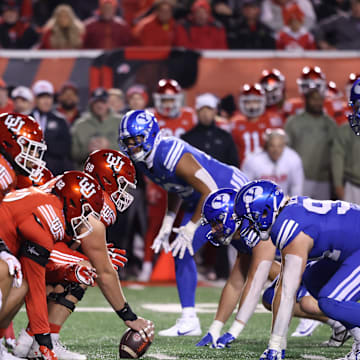 The Utah Utes offense lines up against the Brigham Young Cougars defense during the first quarter at Rice-Eccles Stadium.