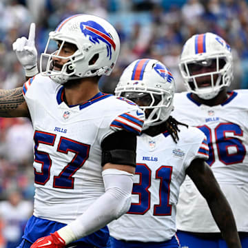 Oct 26, 2025; Charlotte, North Carolina, USA; Buffalo Bills defensive end AJ Epenesa (57) reacts after a sack in the fourth quarter against the Carolina Panthers at Bank of America Stadium. 