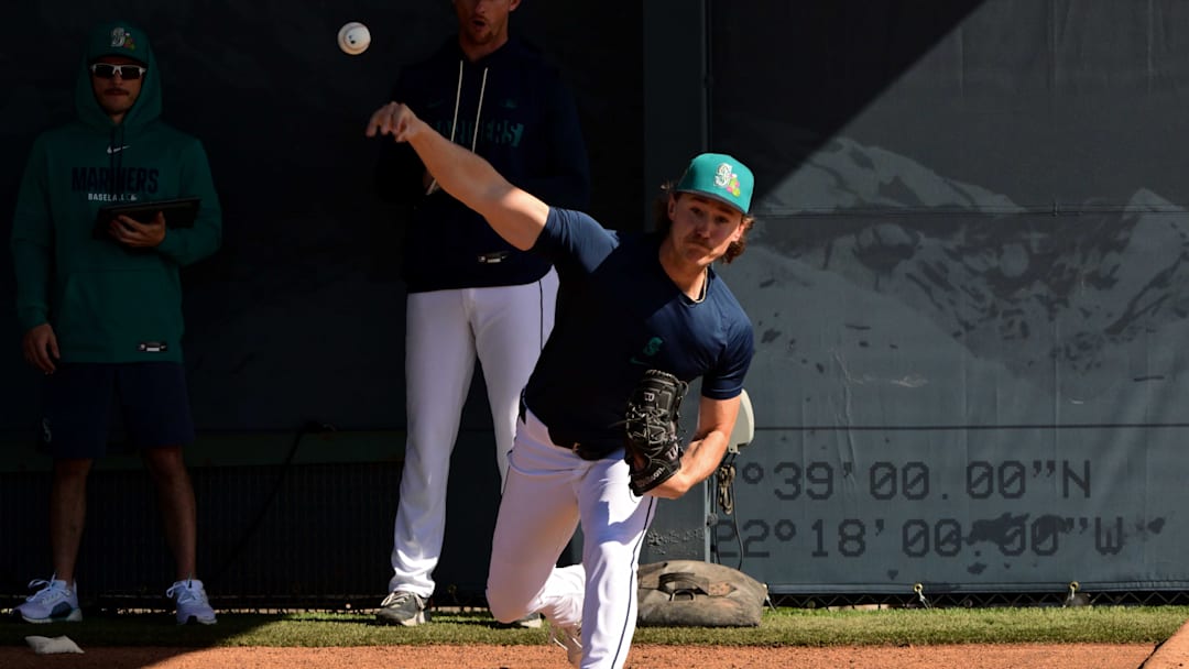 Feb 12, 2026; Peoria, AZ, USA;  Seattle Mariners pitcher Bryce Miller (50) throws during a Spring Training workout at Peoria Sports Complex. Mandatory Credit: Matt Kartozian-Imagn Images