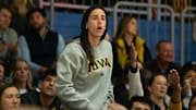 Former Iowa women's basketball player Caitlin Clark reacts after a foul call on Iowa during the Drake vs. Iowa basketball game at Knapp Center on Sunday, Nov. 17, 2024, in Des Moines.