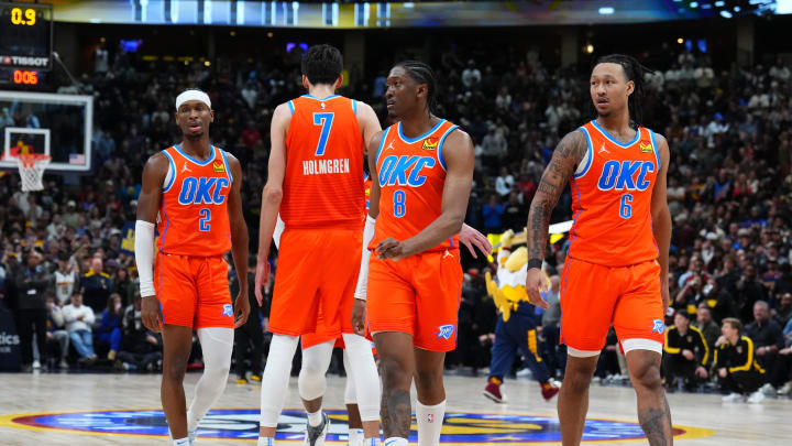 Dec 16, 2023; Denver, Colorado, USA; Oklahoma City Thunder guard Shai Gilgeous-Alexander (2) and forward Chet Holmgren (7) and forward Jalen Williams (8) and forward Jaylin Williams (6) break huddle in the fourth quarter against the Denver Nuggets at Ball Arena. Mandatory Credit: Ron Chenoy-USA TODAY Sports