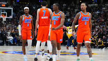 Dec 16, 2023; Denver, Colorado, USA; Oklahoma City Thunder guard Shai Gilgeous-Alexander (2) and forward Chet Holmgren (7) and forward Jalen Williams (8) and forward Jaylin Williams (6) break huddle in the fourth quarter against the Denver Nuggets at Ball Arena. Mandatory Credit: Ron Chenoy-Imagn Images