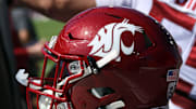 Oct 11, 2025; Oxford, Mississippi, USA; Washington State Cougars helmet sits on the sideline during the second quarter against the Mississippi Rebels at Vaught-Hemingway Stadium. Mandatory Credit: Petre Thomas-Imagn Images