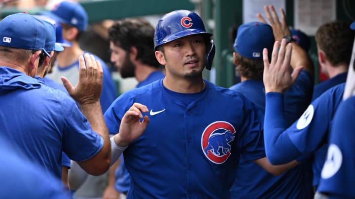 Sep 1, 2024; Washington, District of Columbia, USA; right fielder Seiya Suzuki (27) celebrates in the dugout after scoring a run against the Washington Nationals during the seventh inning at Nationals Park. 