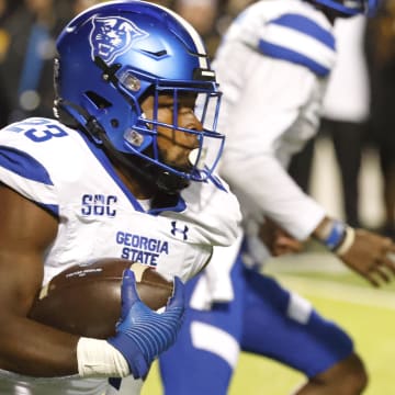 Oct 19, 2022; Boone, North Carolina, USA;  Georgia State Panthers running back Marcus Carroll (23) runs the ball during the second quarter against the Appalachian State Mountaineers at Kidd Brewer Stadium. Mandatory Credit: Reinhold Matay-USA TODAY Sports