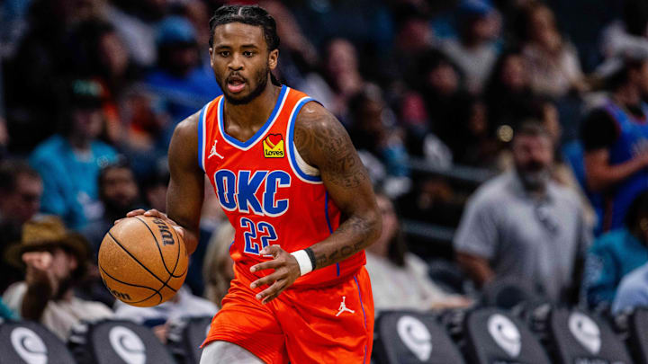 Apr 7, 2024; Charlotte, North Carolina, USA; Oklahoma City Thunder guard Cason Wallace (22) brings the ball up court against the Charlotte Hornets at Spectrum Center. Mandatory Credit: Scott Kinser-Imagn Images