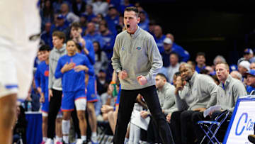 Jan 4, 2025; Lexington, Kentucky, USA; Florida Gators head coach Todd Golden cheers on his players during the second half against the Kentucky Wildcats at Rupp Arena at Central Bank Center. Mandatory Credit: Jordan Prather-Imagn Images